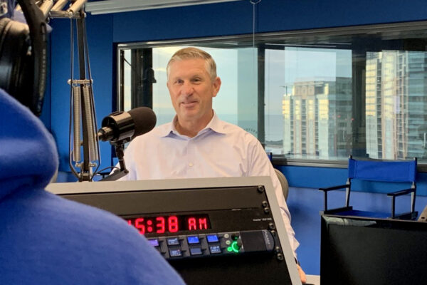 Photo of Benesch’s Kevin Fitzpatrick and host Rick Pearson during a Sunday Spin interview on WGN Radio 720.