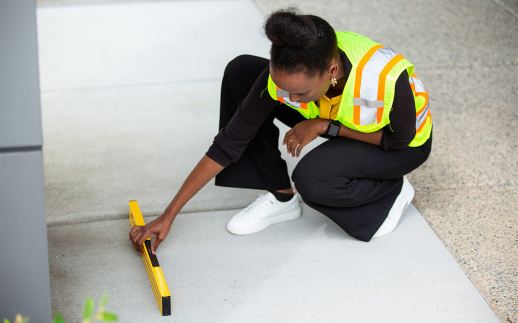 Photo of Benesch employee performing ADA field assesment