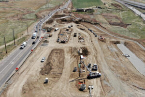 Aerial view photo of the construction work being carried out at the intersection of Quincy Ave and Gun Club.