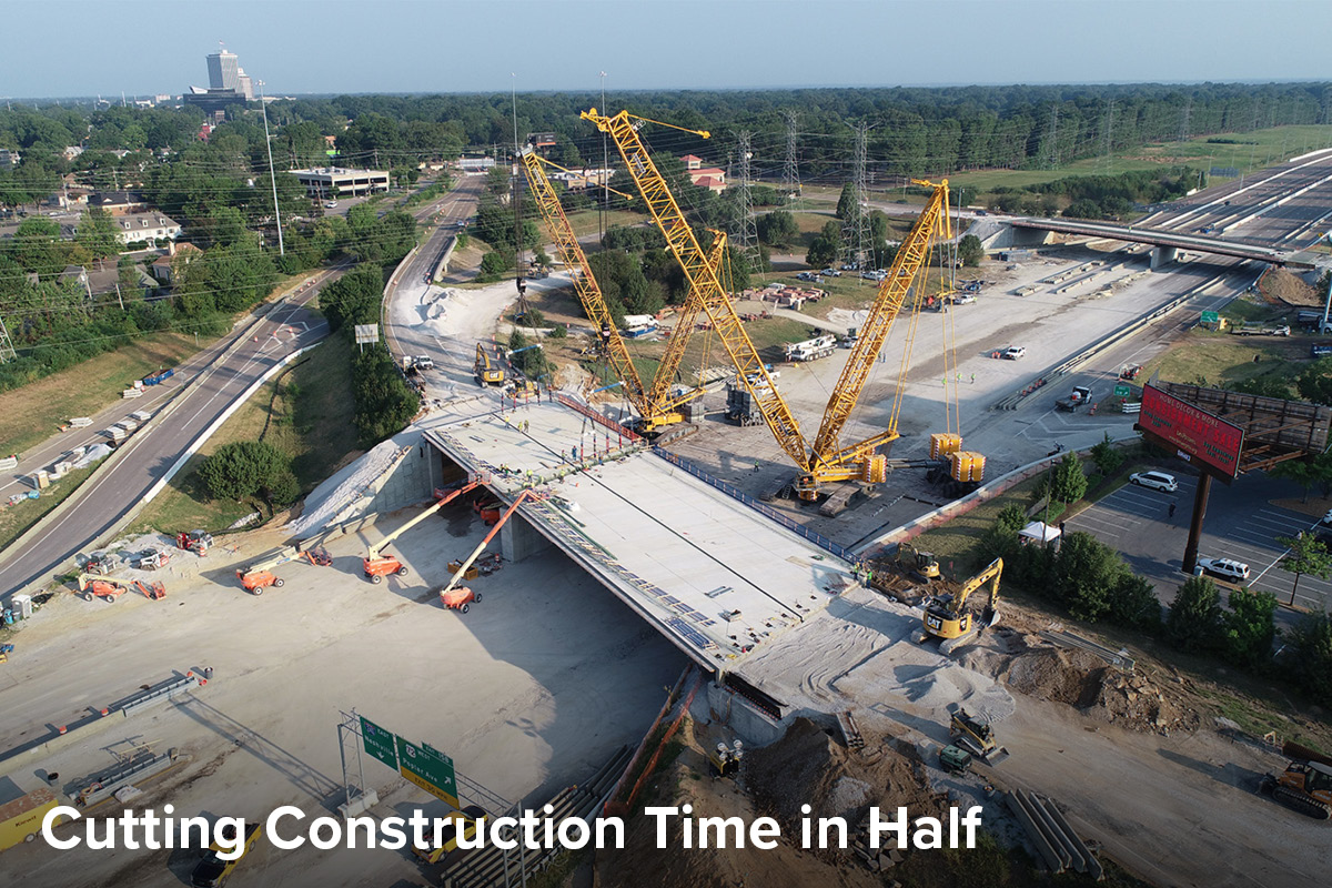 aerial view of two cranes placing a modular bridge structure over I-124 in Memphis, TN