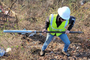 Photo of Benesch's employee performing a sampling in the field