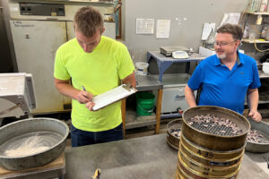 Photo of Benesch's employee working in fully accredited lab