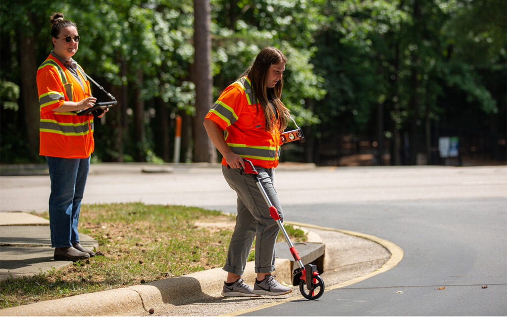 Photo of Benesch employees gathering field data