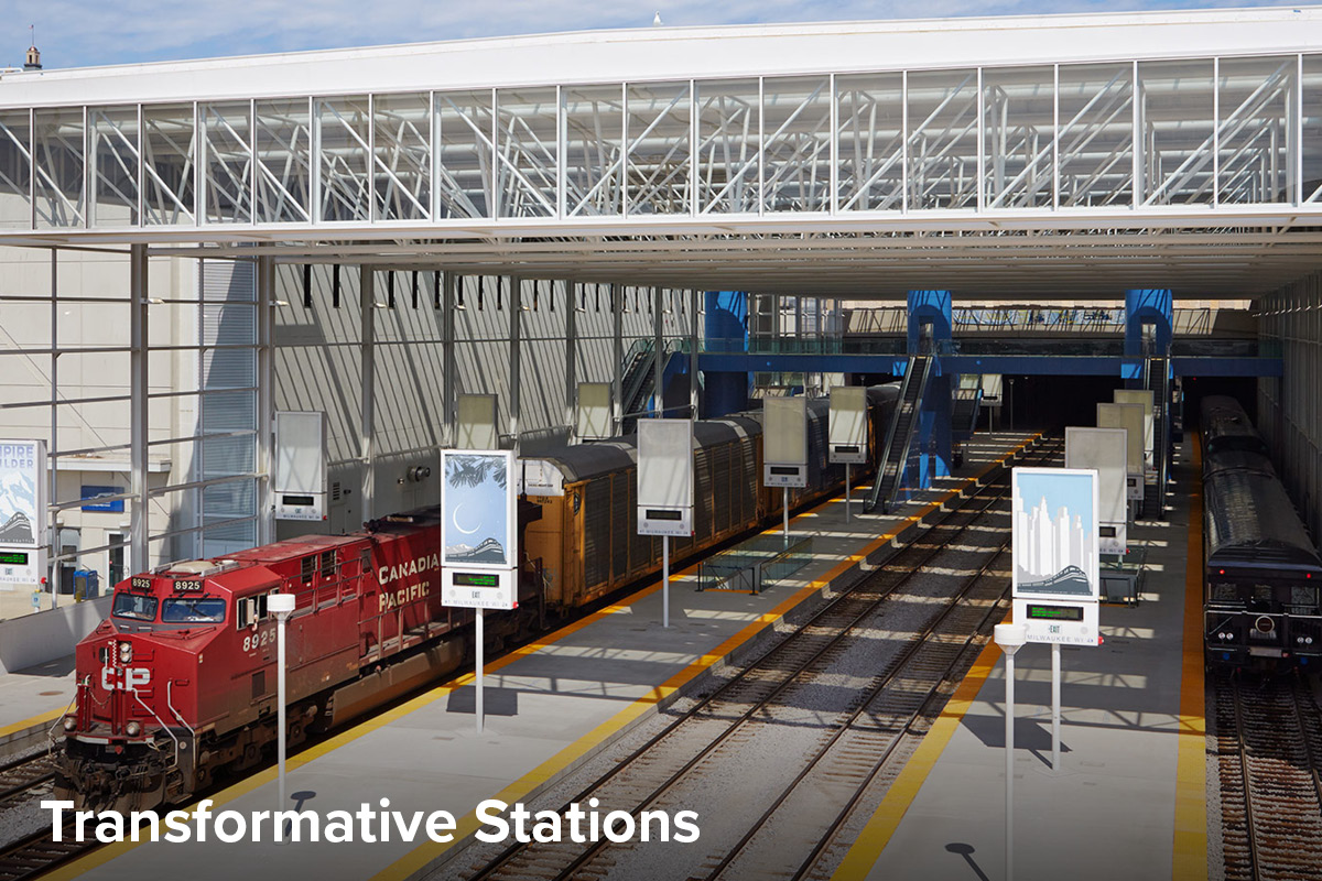 view of the new Milwaukee Train Shed with two trains passing by the fully ADA accessible platforms