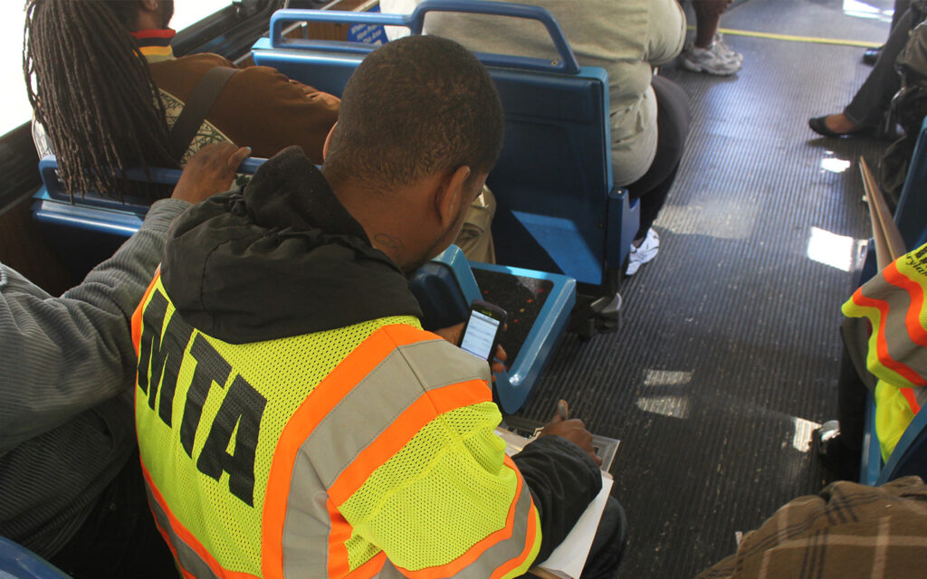 Photo of mystery rider on board of a bus on MTA transit system in Maryland