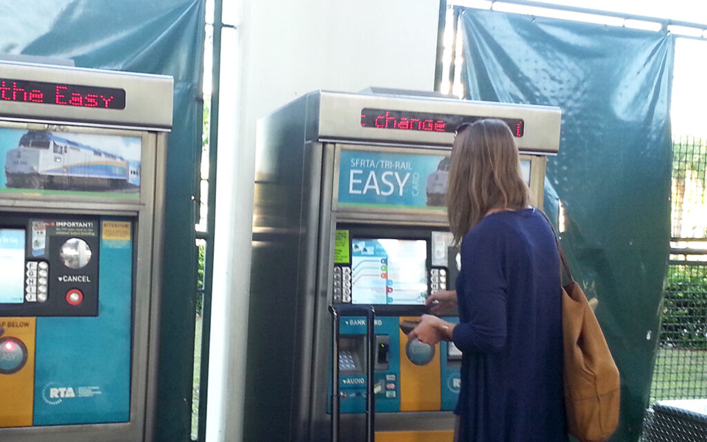 Woman at kiosk