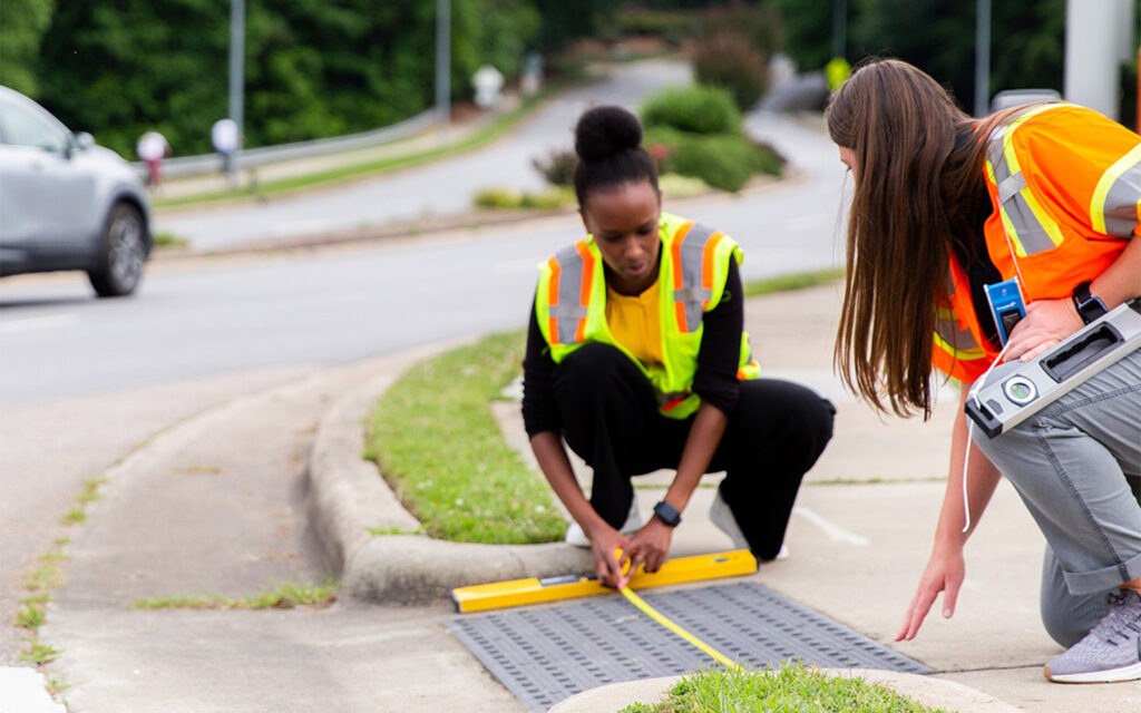 Photo of Benesch' ADA team performing a field review