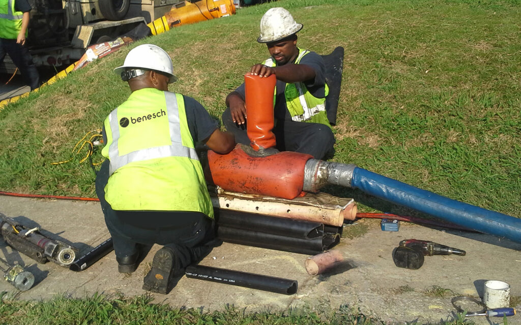 Photo of Benesch's employee working on combined sewer overflown in Kansas