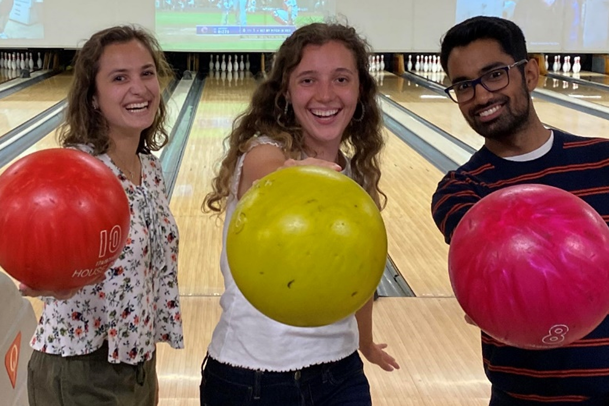 Photo of a group of Benesch interns out for a night of bowling