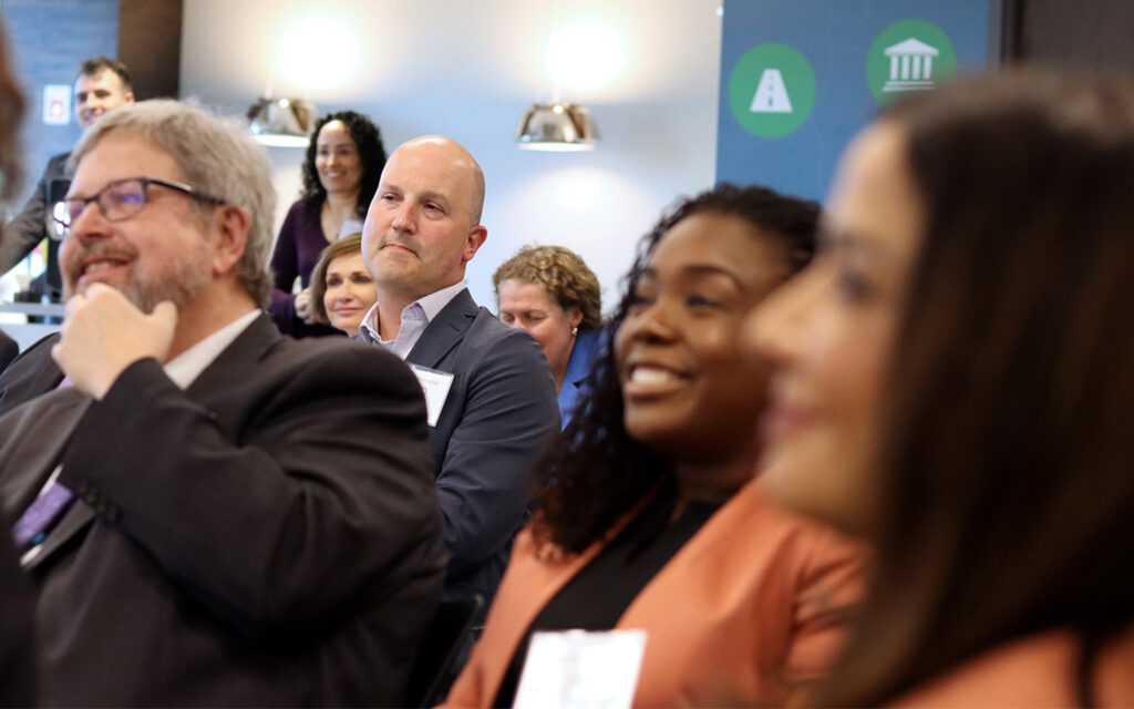 Group photo of Benesch employees at a professional development event