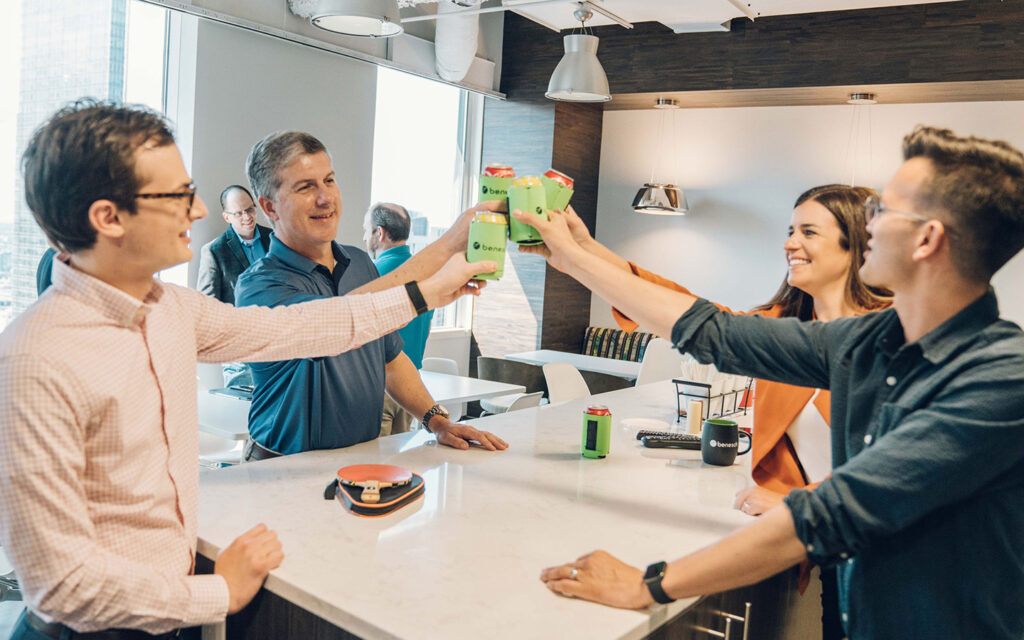 Photo of Benesch employees socializing at a happy hour