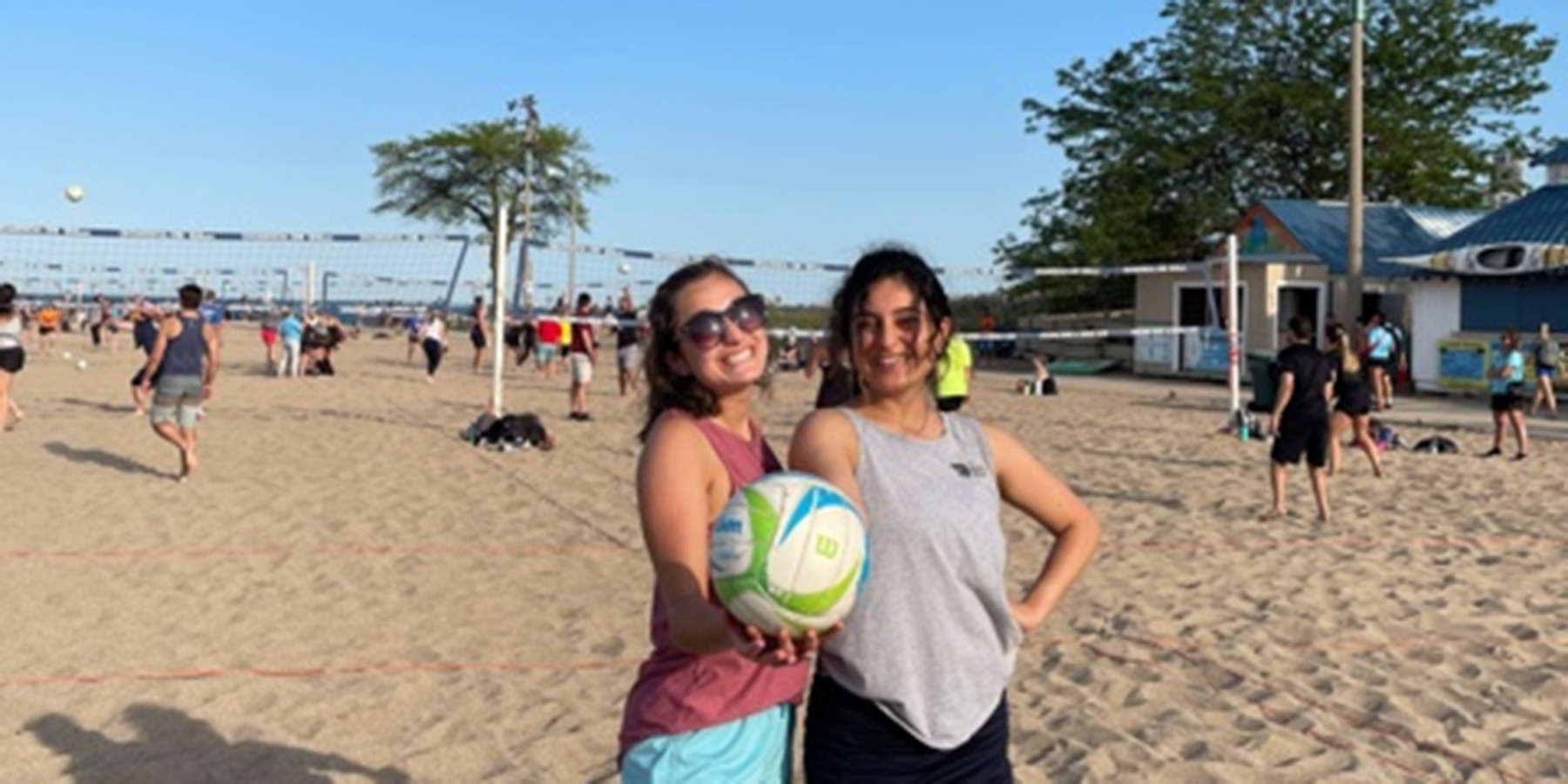 Photo of Benesch employees playing volleyball