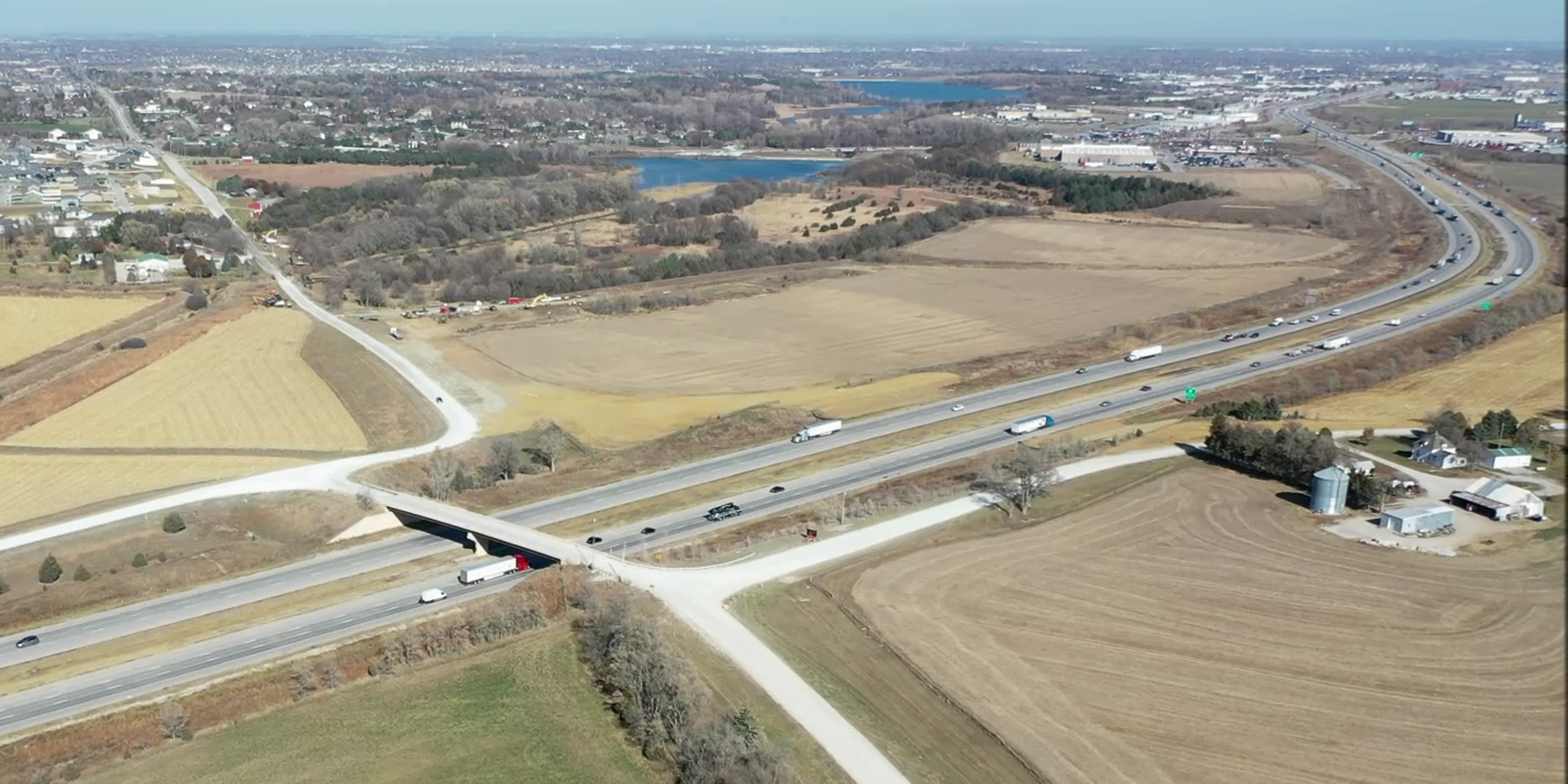 A photo from above showing I-80 and a highway bridge