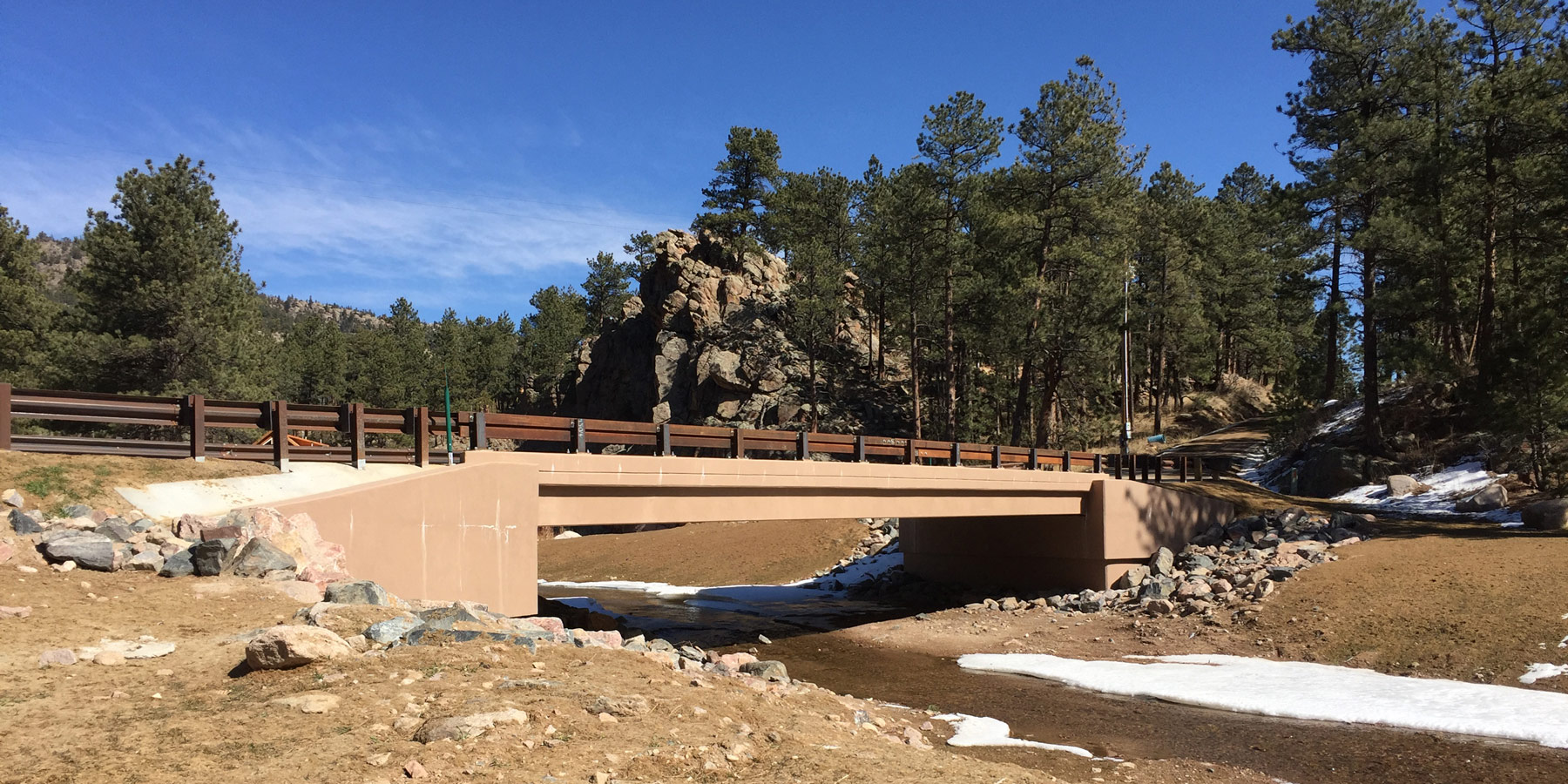 bridge in mountains over water