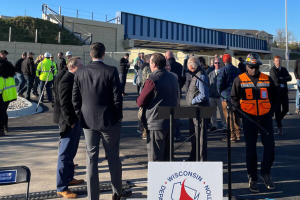 Photo of Zoo Interchange Rail Bridge ribbon cutting ceremony with people gathered