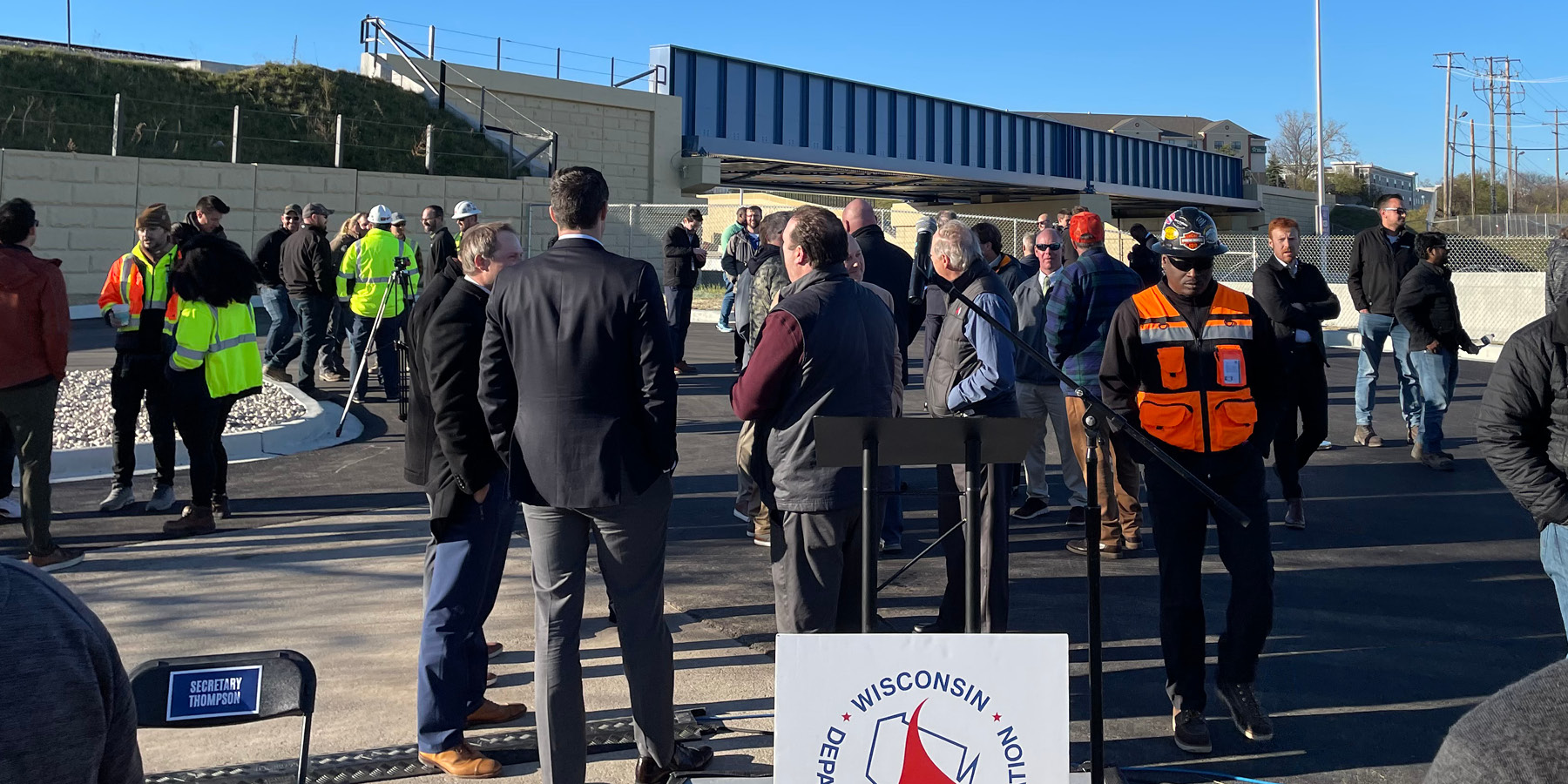 Photo of Zoo Interchange Rail Bridge ribbon cutting ceremony with people gathered