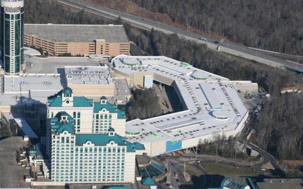 Aerial zoom out view of Tanger Outlet Malls in Connecticut