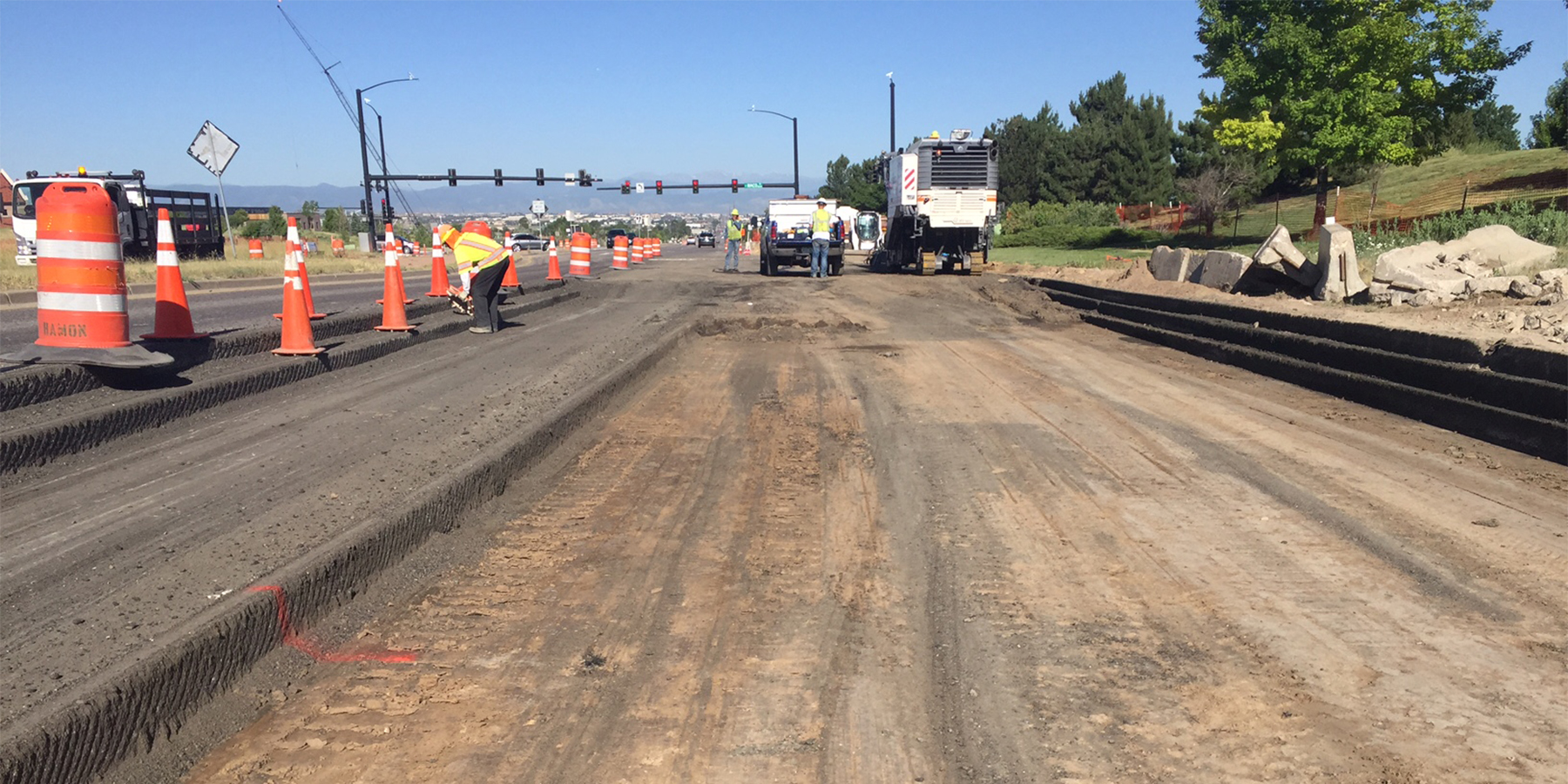 photo of contstruction on Arapahoe Road, showing staged construction with traffic coming through the construction site