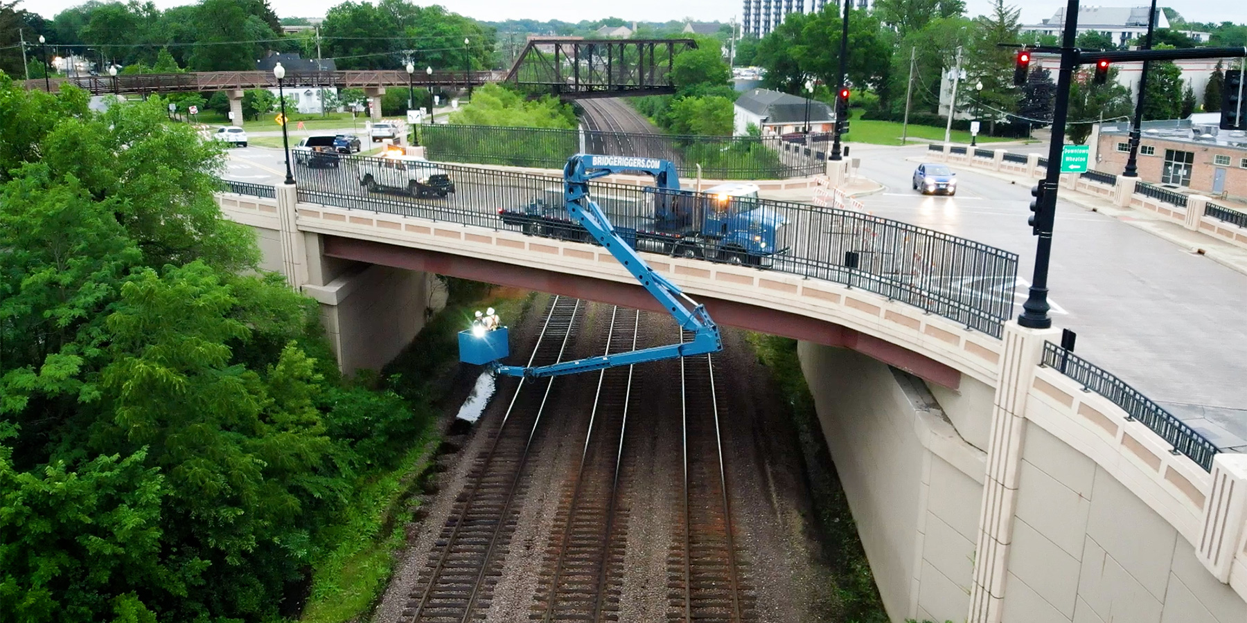 Aerial photo of Benesch's staff performing a bridge inspection