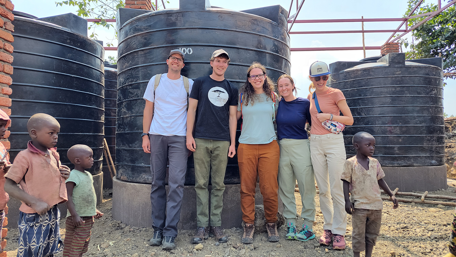 Photo of Benesch Project Manager with students on a trip for Engineers without Borders