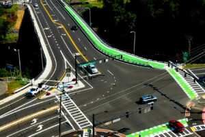 Aerial photo of a complete street intersection highlight safety for pedestrian and bicyclists