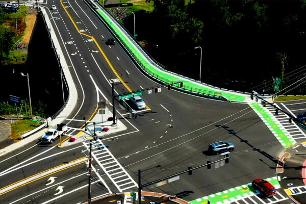 Aerial photo of a complete street intersection highlight safety for pedestrian and bicyclists