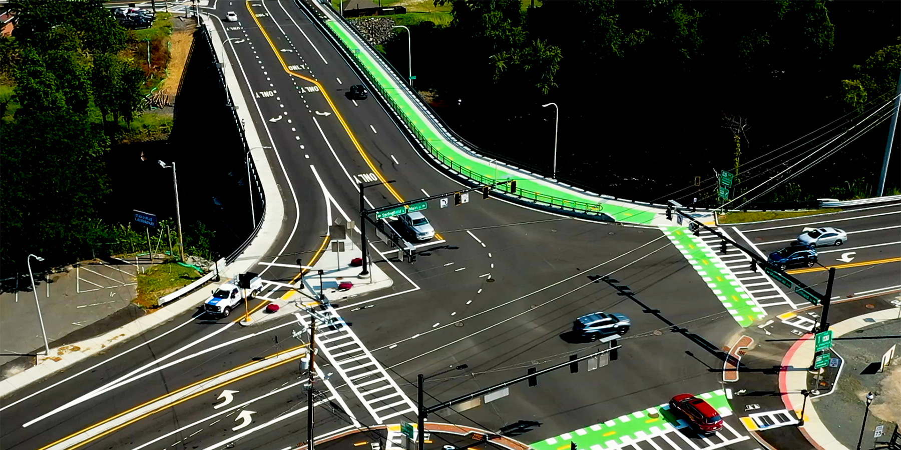 Aerial photo of a complete street intersection highlight safety for pedestrian and bicyclists