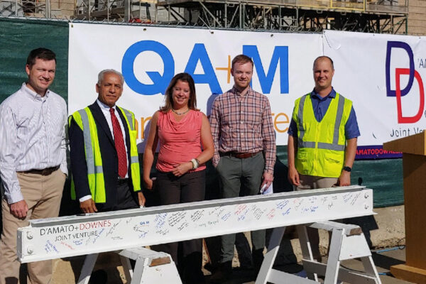 Photo of Benesch employee during the beam signing ceremony at the new Memorial Boulevard Intradistrict Arts Magnet School