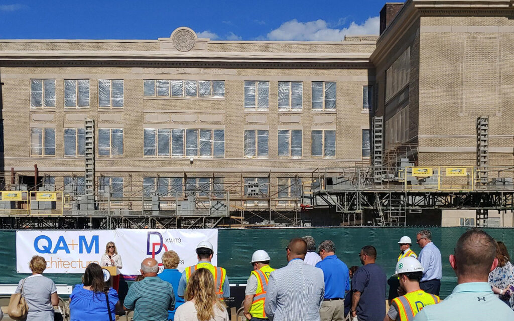 Photo of community members attending the beam signing ceremony at the new Memorial Boulevard Intradistrict Arts Magnet School