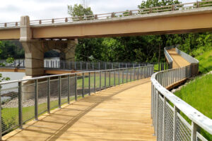 Photo of a pedestrian walkaway under a bridge