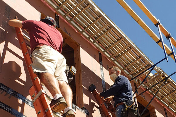 Photo of Benesch employees volunteering at a house built for Habitat for Humanity in Glastonbury