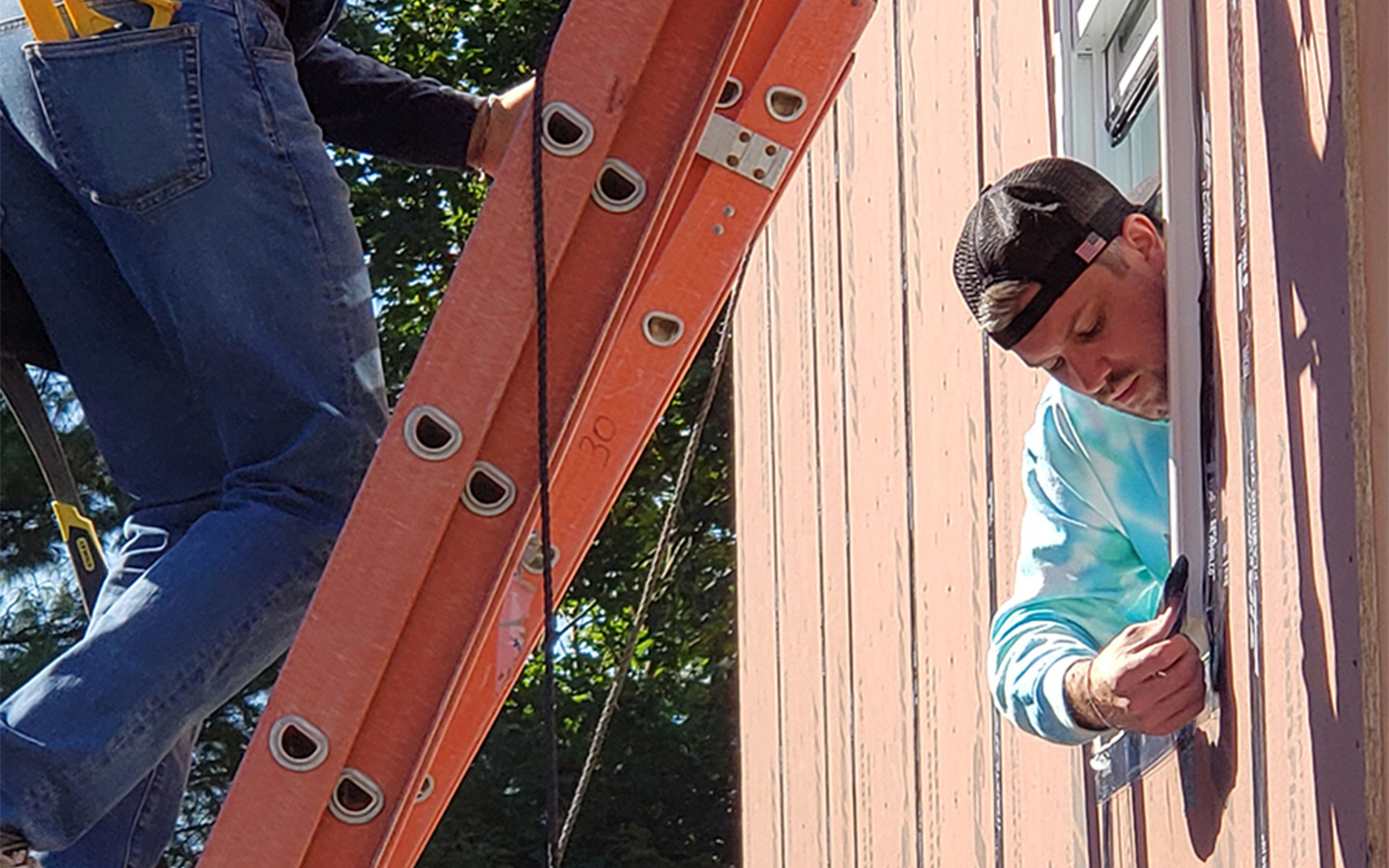 Photo of Benesch employees volunteering at a house built for Habitat for Humanity in Glastonbury