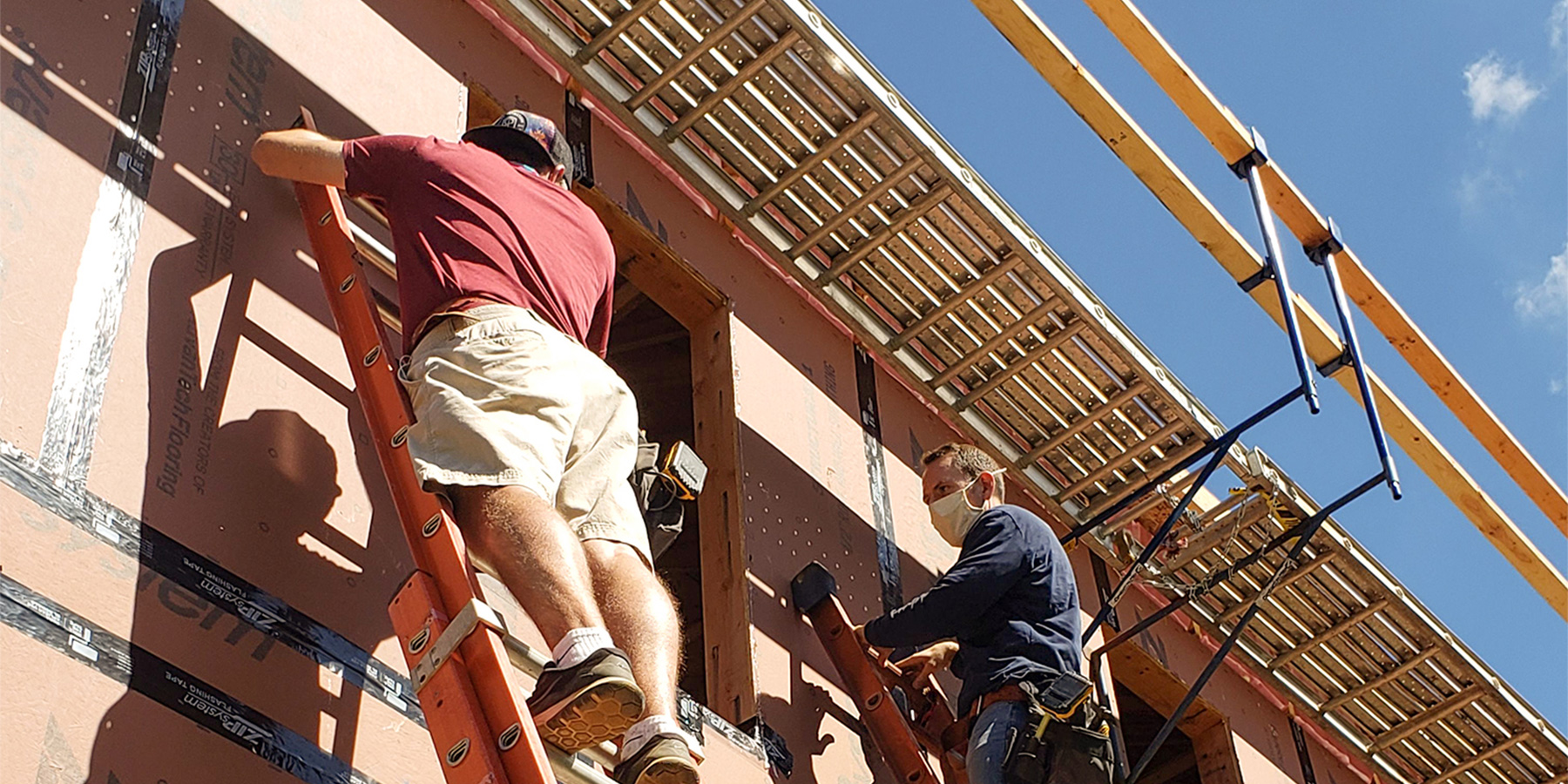 Photo of Benesch employees volunteering at a house built for Habitat for Humanity in Glastonbury