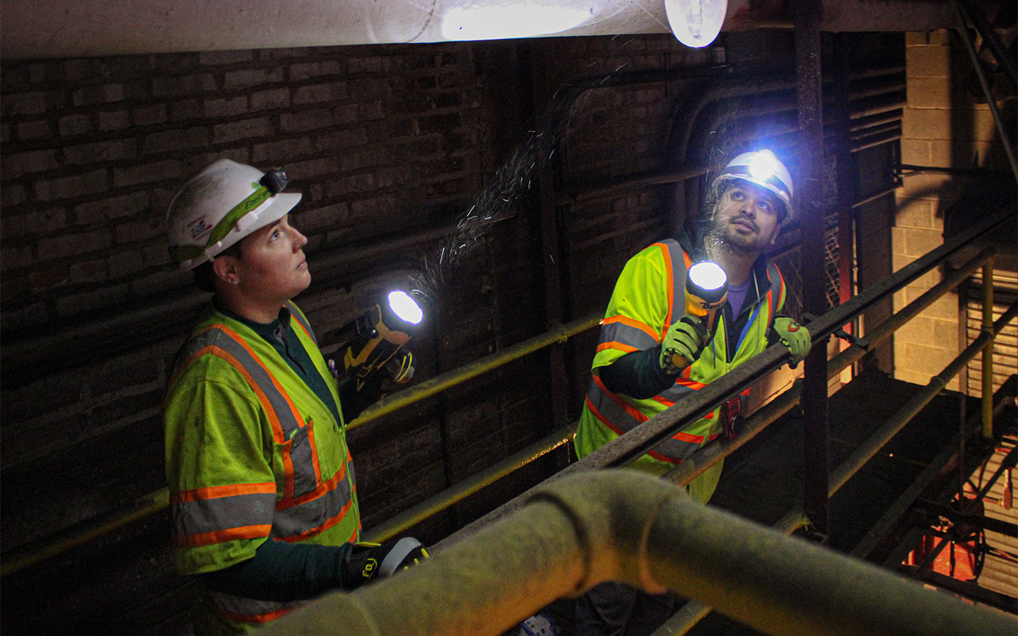 Benesch inspectors assess the sidewalk framing and soffit in the fixed spans.