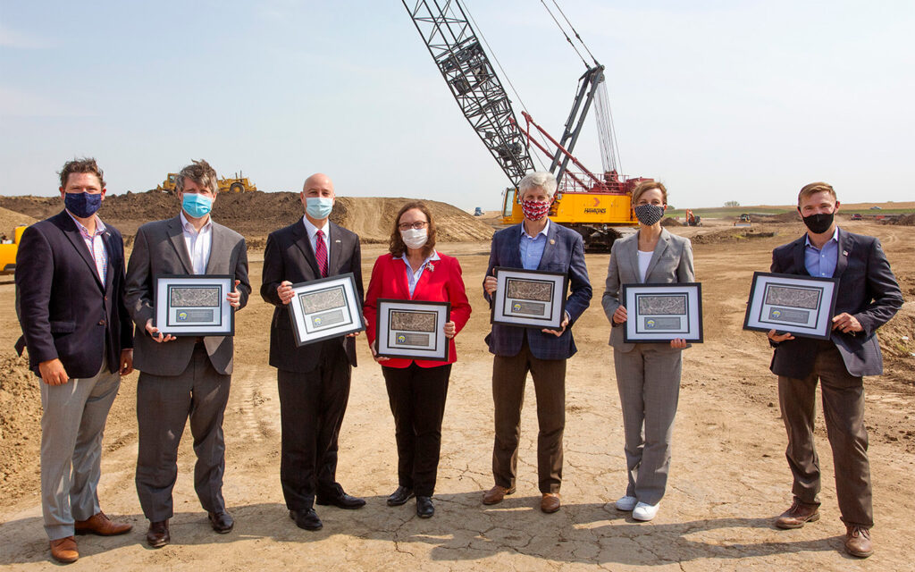 Photo of state and local officials celebrating the progress of the Lincoln South Beltway