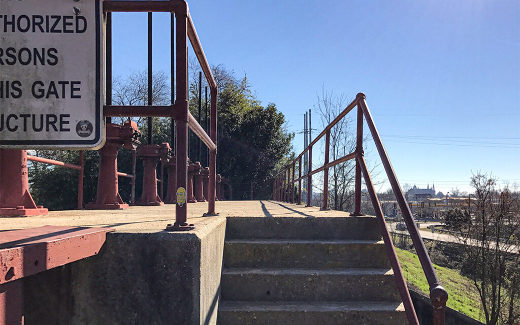 Photo of existing levee gate that was incorporated in the River Levee Trail design