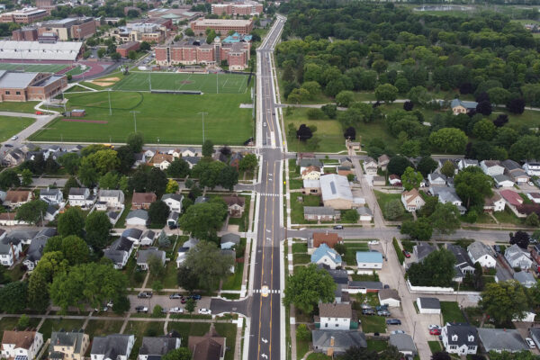 Aerial view of the reconstructed STH 16 (La Crosse Street) in La Crosse, WI. The new roadway cuts through residential areas and runs alongside the UW-La Crosse campus and includes new medians and left turn lanes.