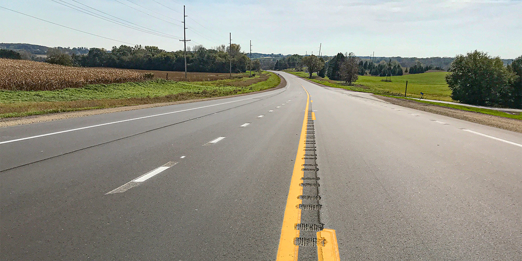 Photo of State Trunk Highway (STH-49) asphalt recycling process in Wisconsin