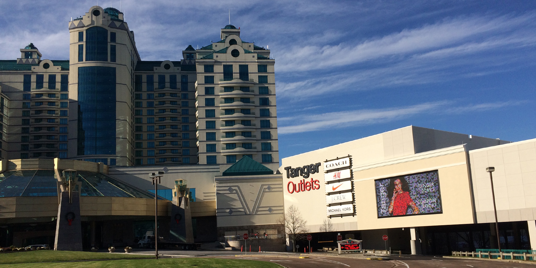 view of the entrance to the Tanger Outlet Mall and adjoining hotel