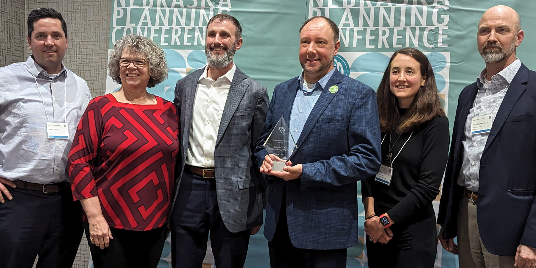 photo of members of the I-80 PEL study team accepting their APA-NE award