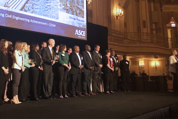 Group photo of Benesch's team receiving the Outstanding Civil Engineering Achievement in the 2017 ASCE Award Ceremony