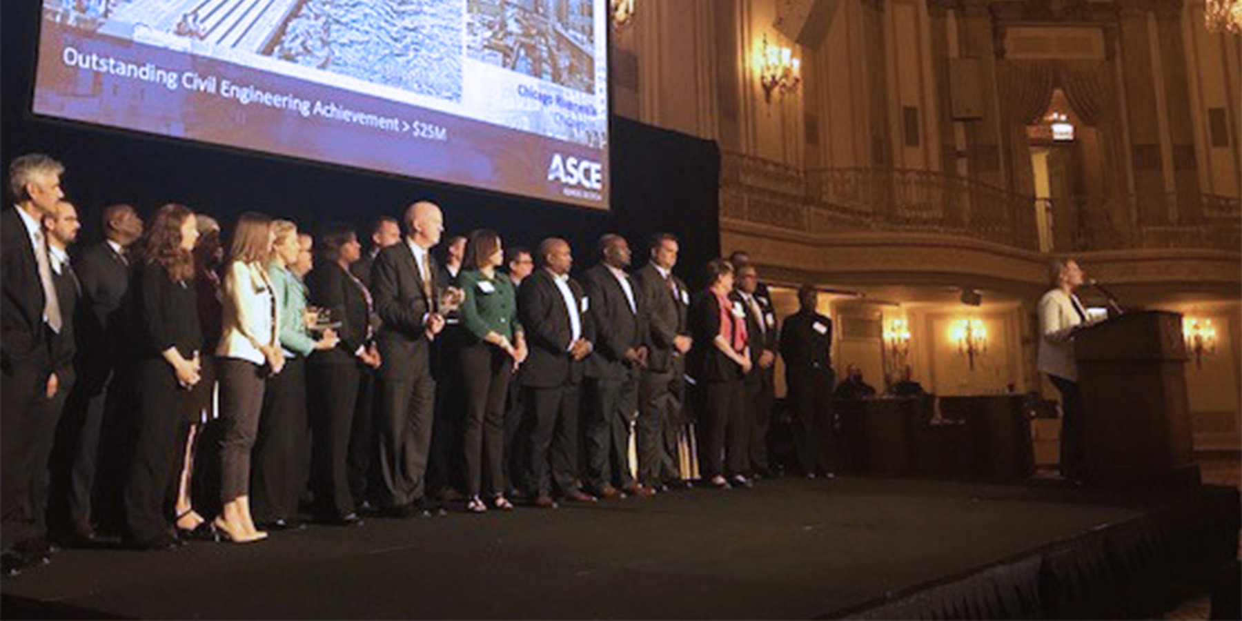 Group photo of Benesch's team receiving the Outstanding Civil Engineering Achievement in the 2017 ASCE Award Ceremony