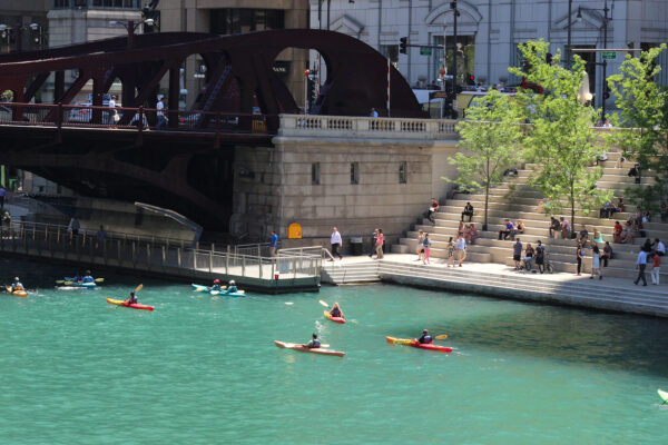 Photo of kayakers at the Chicago Riverwalk opening weekend