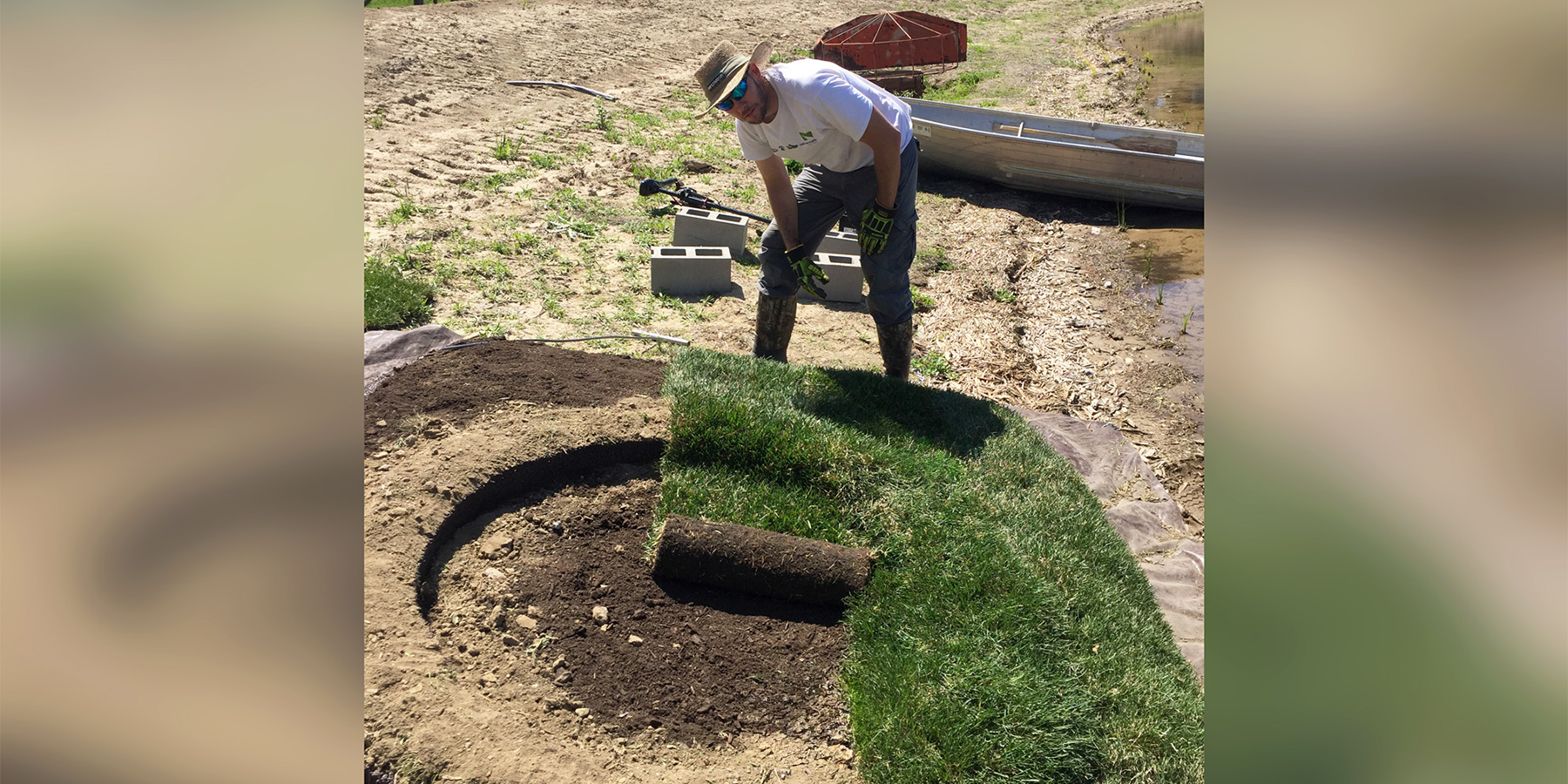 Photo of Benesch's employee setting up the structure for a floating island in Omaha