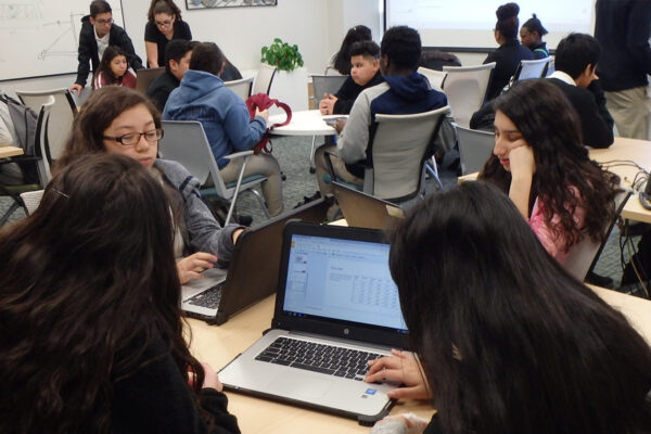 Photo of students from Argentine Middle School in Kansas City, Kansas partnering up with Alfred Benesch & Company’s Kansas City office to offer students an opportunity to apply what they are learning while also seeing what a career in civil engineering entails.