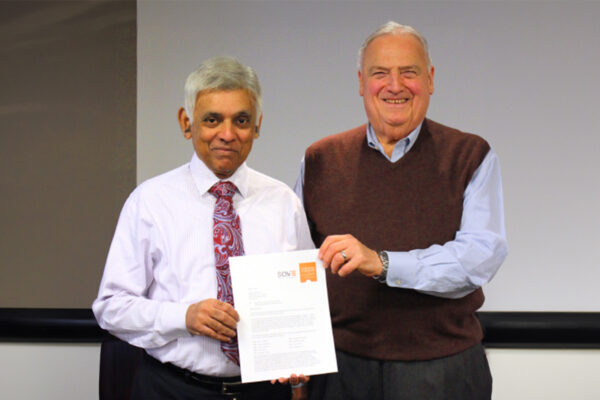 Photo of Benesch Chairman Emeritus, Muthiah Kasi, PE, SE, CVS (life), FSAVE, receiving the Lawrence D. Miles Founders Award from SAVE International Engineering