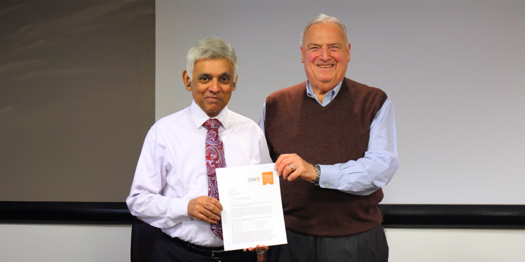 Photo of Benesch Chairman Emeritus, Muthiah Kasi, PE, SE, CVS (life), FSAVE, receiving the Lawrence D. Miles Founders Award from SAVE International Engineering