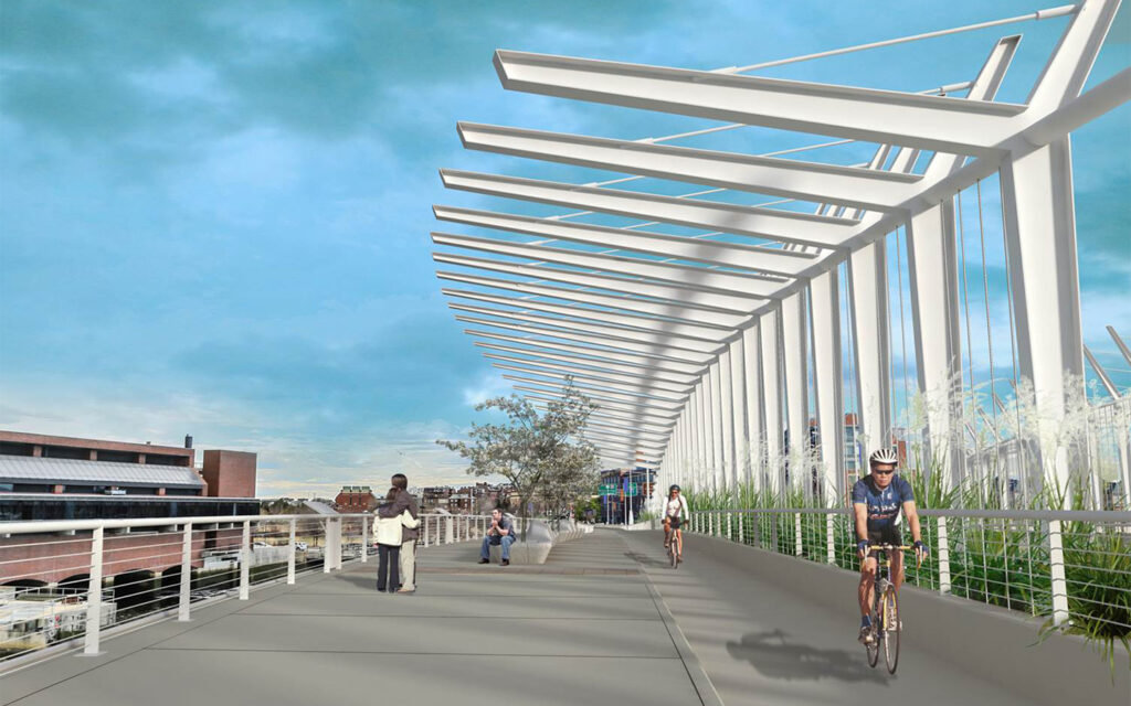 Photo rendering of North Washington Street bridge during day with pedestrian and bicyclist in Boston, Massachusetts