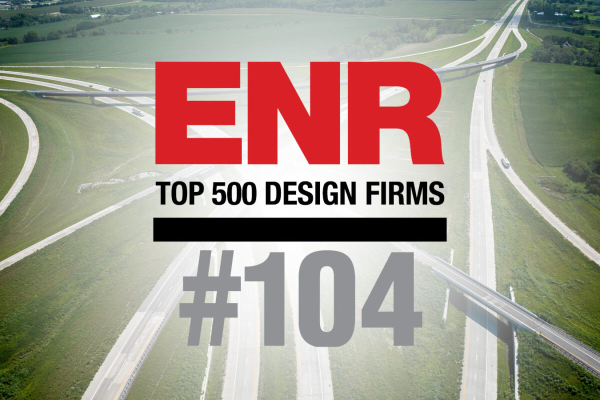 aerial image of a highway with the ENR Top 500 Design Firms logo super imposed across it, including Benesch ranking of #104
