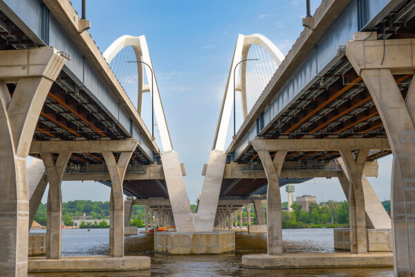 A photo of the I-74 Mississippi River Bridge from underneath the bridges